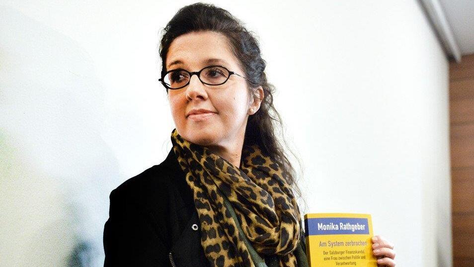 Rathgeber präsentiert Buch, I
