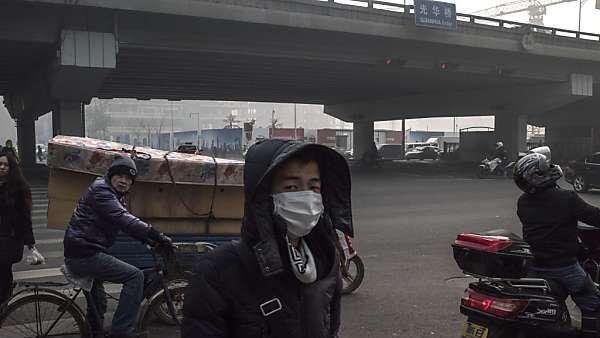 Atemschutzmasken gehören zum Straßenbild in China