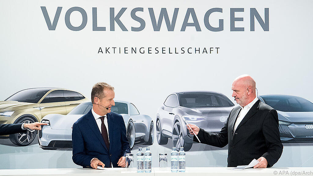 Diess (l.) setzt auch auf E-Mobilität