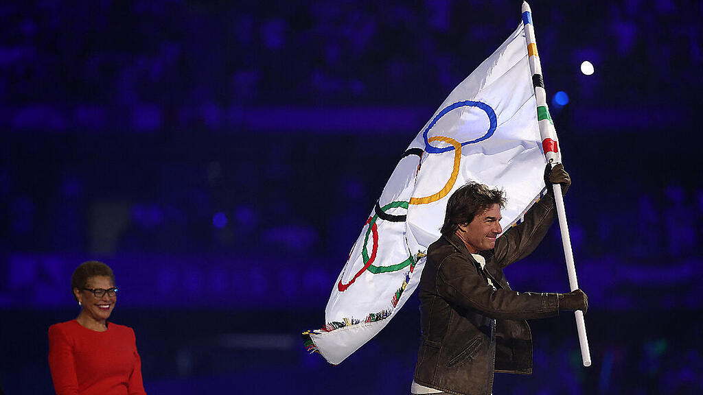 Tom Cruise entwischte mit der olympischen Flagge