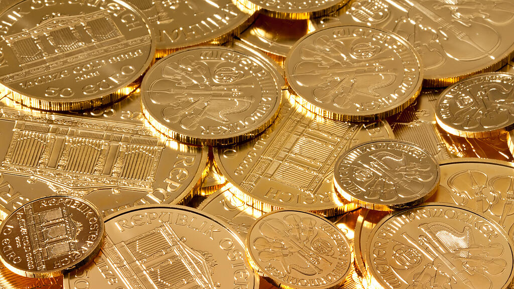 137692_Geldanlage_in_echtem_Gold_als_Goldbarren_und_Goldmuenzen.jpg