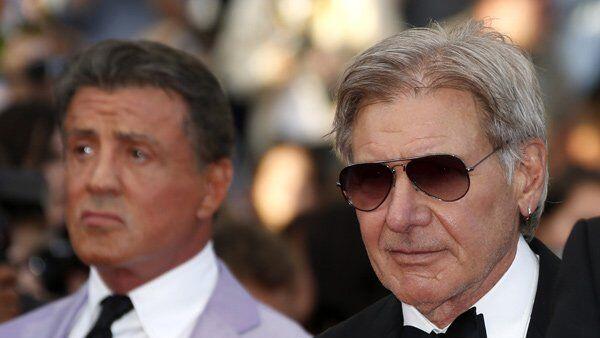 Schauspieler Harrison Ford (rechts) mit Sylvester Stallone bei den Filmfestspielen in Cannes.